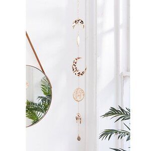 Ariana Ost Resin Moon Phase Wall Hanging Tortoise from Urban Outfitters